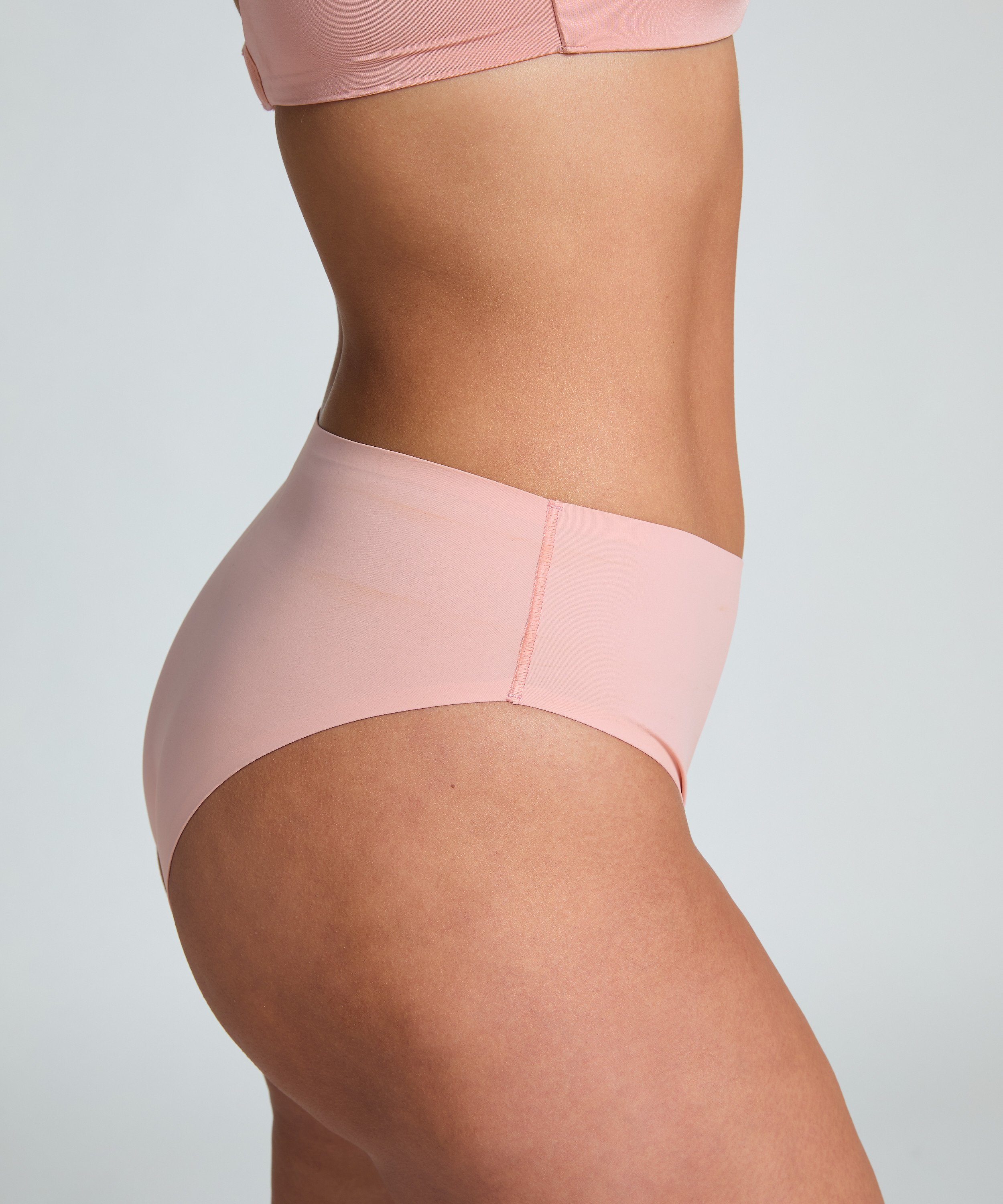 Slip brésilien Smooth, Rose, main