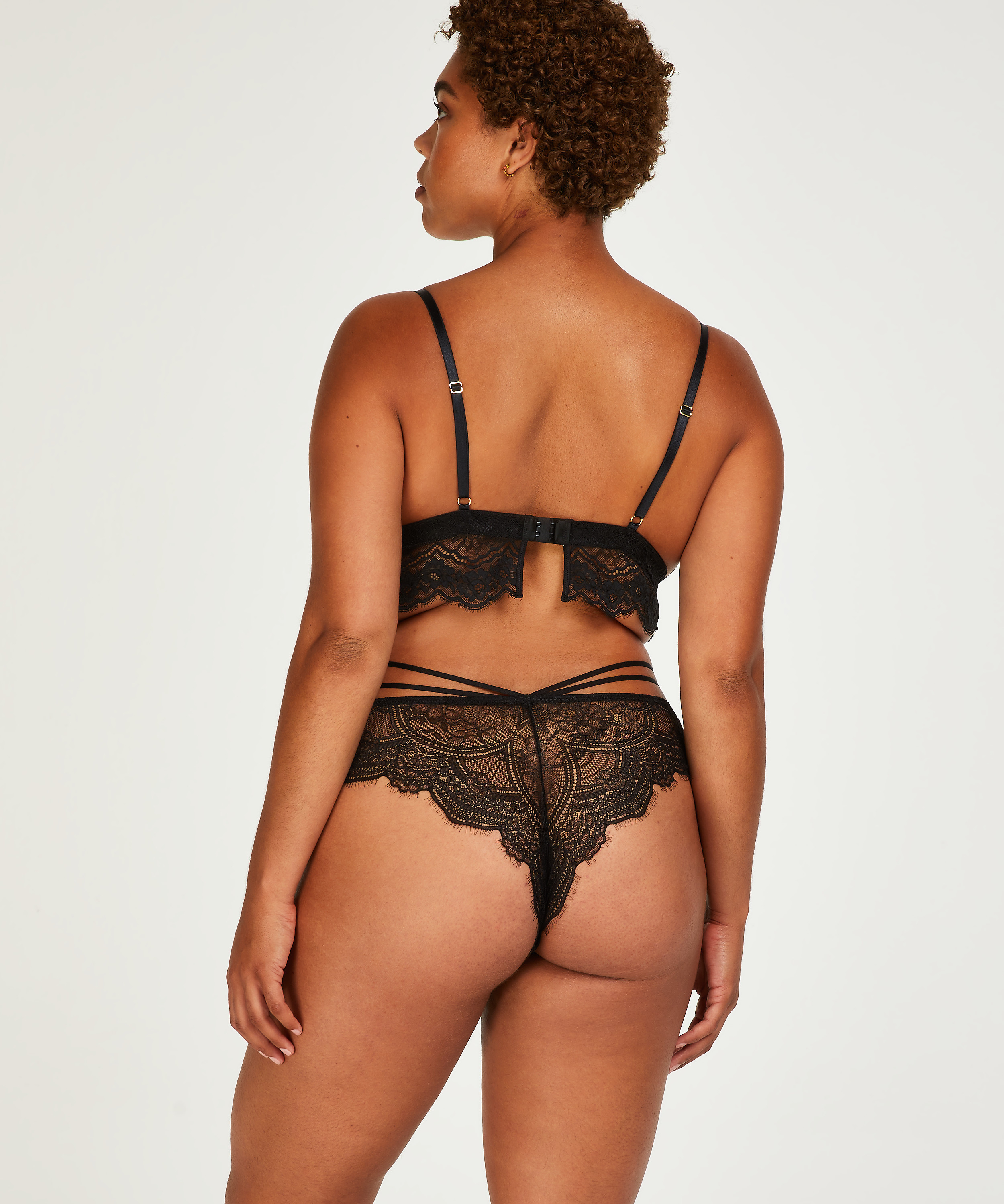 Slip brésilien échancré Sian, Noir, main