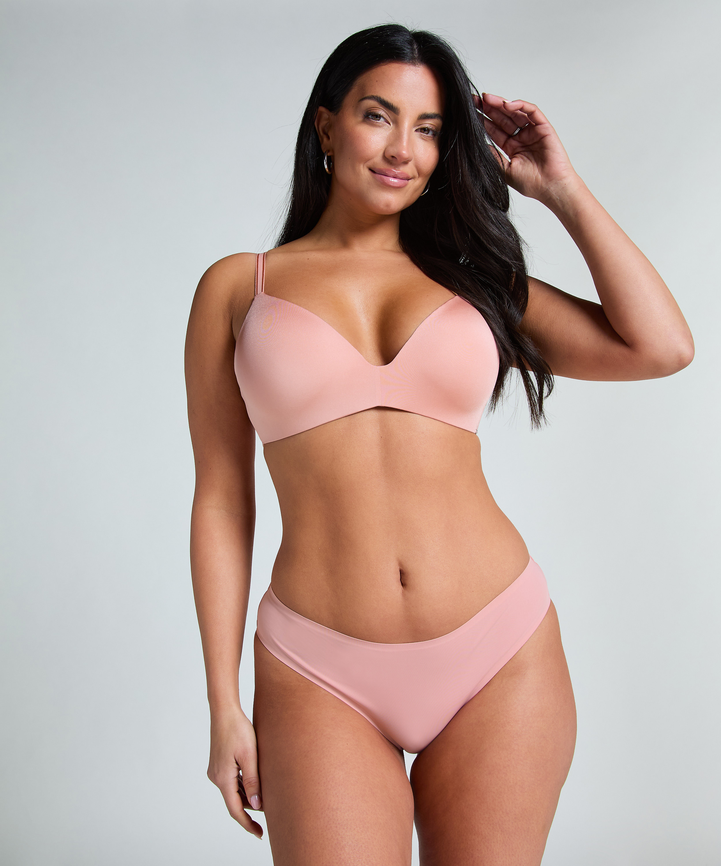 Slip brésilien Invisible, Rose, main